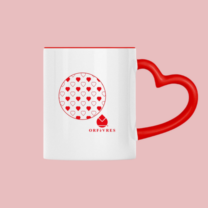 Orfèvres Saint-Valentin heart-shaped handle mug.